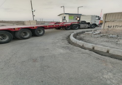 اجرای عملیات جدول کاری ورودی پارکینگ عمومی خودروهای سنگین شهرداری